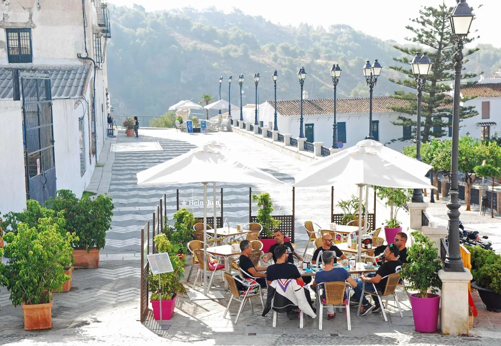 group of digital nomads at café in Frigiliana Spain